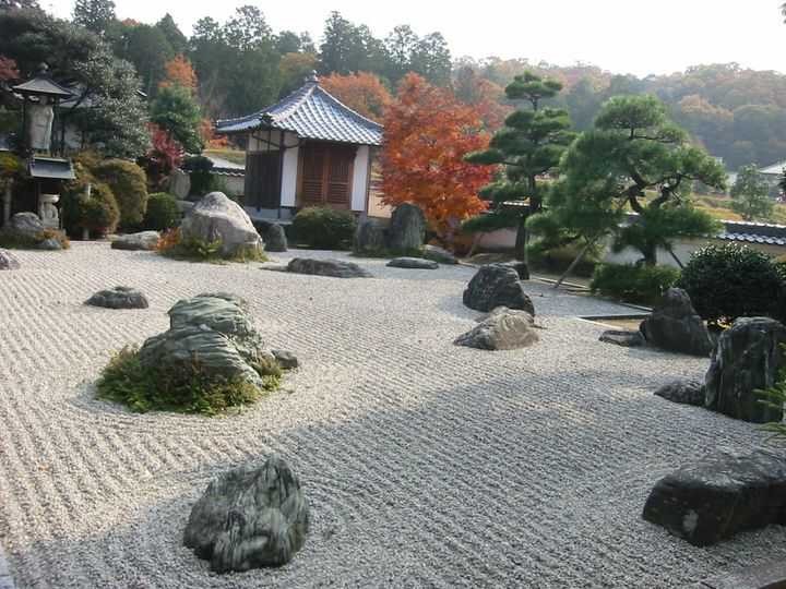 Rock garden with pines and a small pavilion