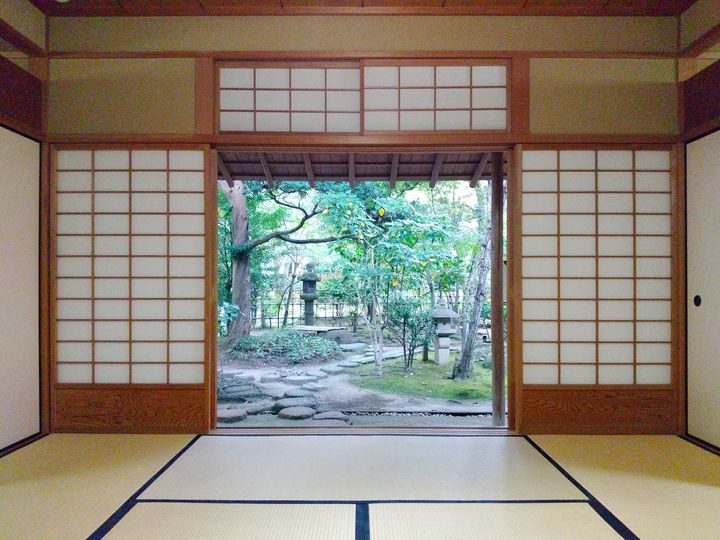 Tatami room opening onto a garden